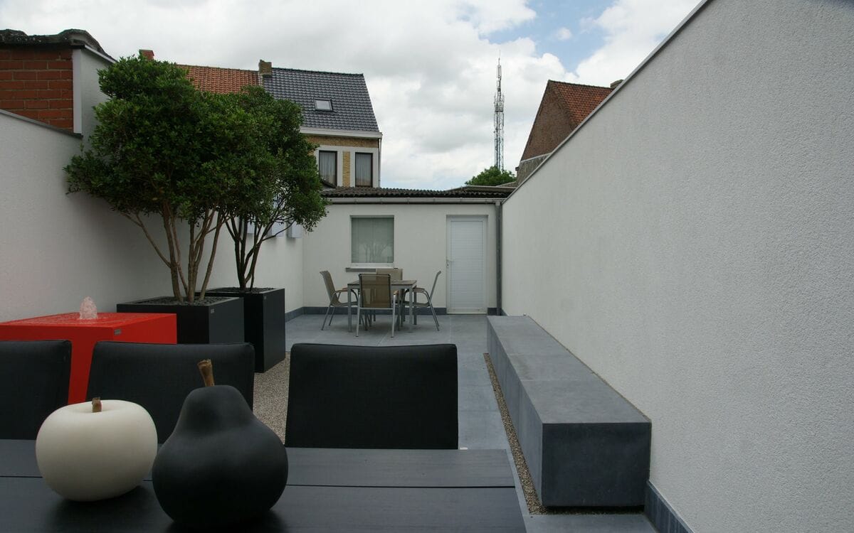 Binnentuin in blauwsteen met solitair